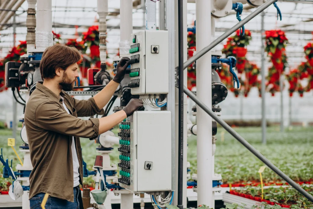 man florist working green house
